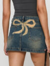 Y2K High Waist Denim Mini Skirt with Bow Print
