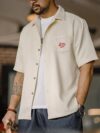 Hawaiian-inspired embroidered shirt for men